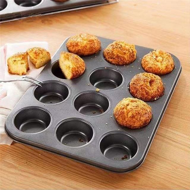 9397f0b1-b34b-4b19-b297-b599881e1e86 (1) 12 holes cupcake baking tins - Image 1
